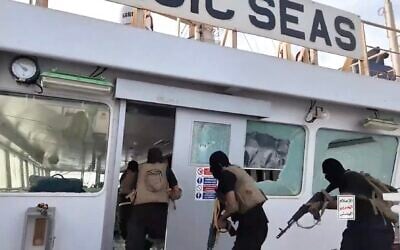 Screen capture from video of Houthi gunmen storming the bridge of the Iberian-flagged cargo ship Magic Seas before they sank it July 8, 2025. (Houthi Media Office)